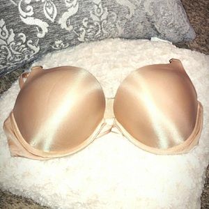 nude Victoria’s Secret bombshell bra.